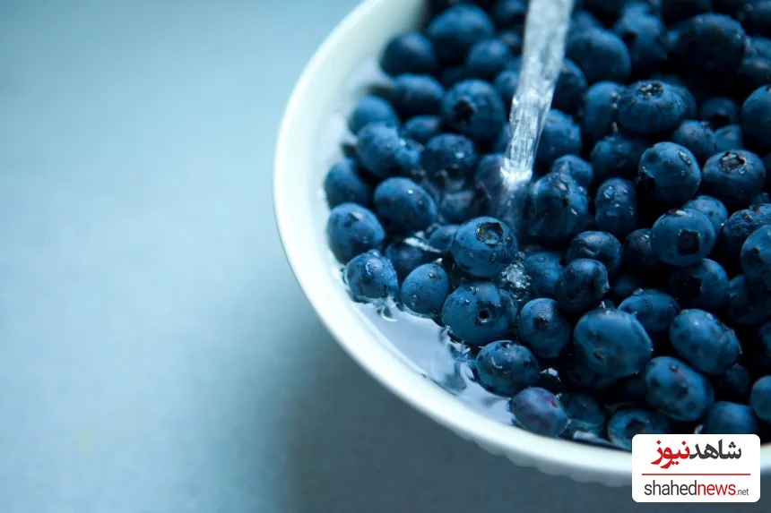 After a baking soda soak, rinse blueberries with cool water and dry carefully to prevent spoilage.