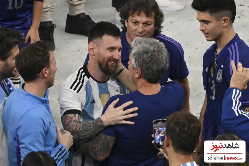 Argentina's Lionel Messi celebrates with his father Jorge Messi following his team's win during 2022 FIFA World Cup final match against France at Lusail Stadium in Qatar on December 18. 2022.